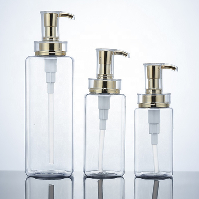 贅沢な300ml 400ml 500mlのホテルの空のコンディショナーPackaging16ozの人の金ポンプを搭載する明確なローションのプラスチック シャンプーのびん