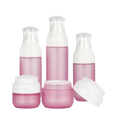 贅沢なピンクのSkincareの化粧品の包装は表面クリームのローションのびん138mlを置きます