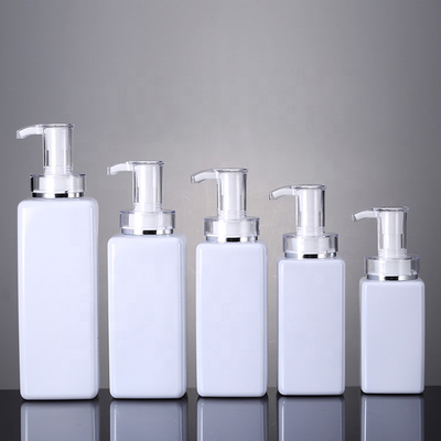 贅沢な300ml 400ml 500mlのホテルの空のコンディショナーPackaging16ozの人の金ポンプを搭載する明確なローションのプラスチック シャンプーのびん